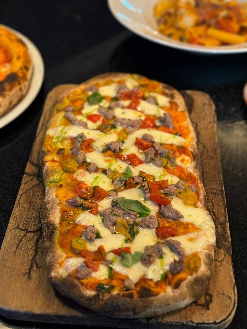 Pinsa served on a wooden board